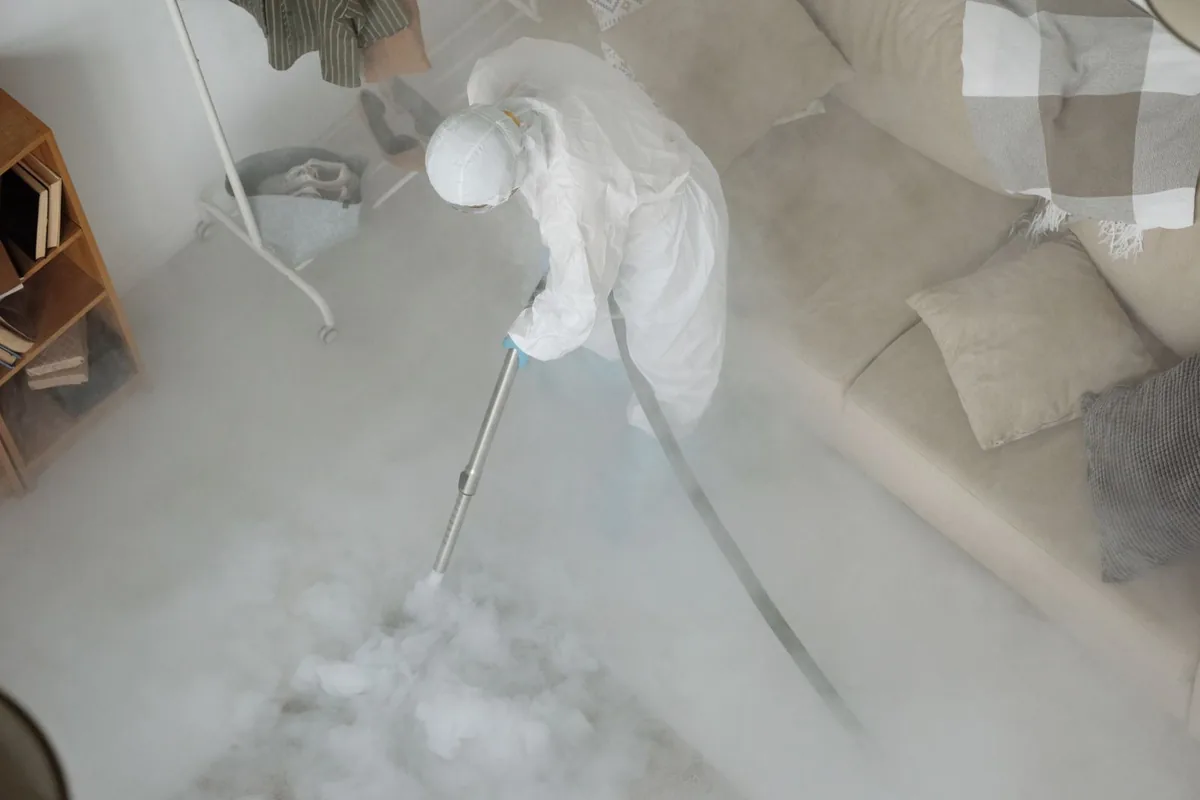 Biohazard cleanup technician in protective equipment, Bon Aqua Junction, TN